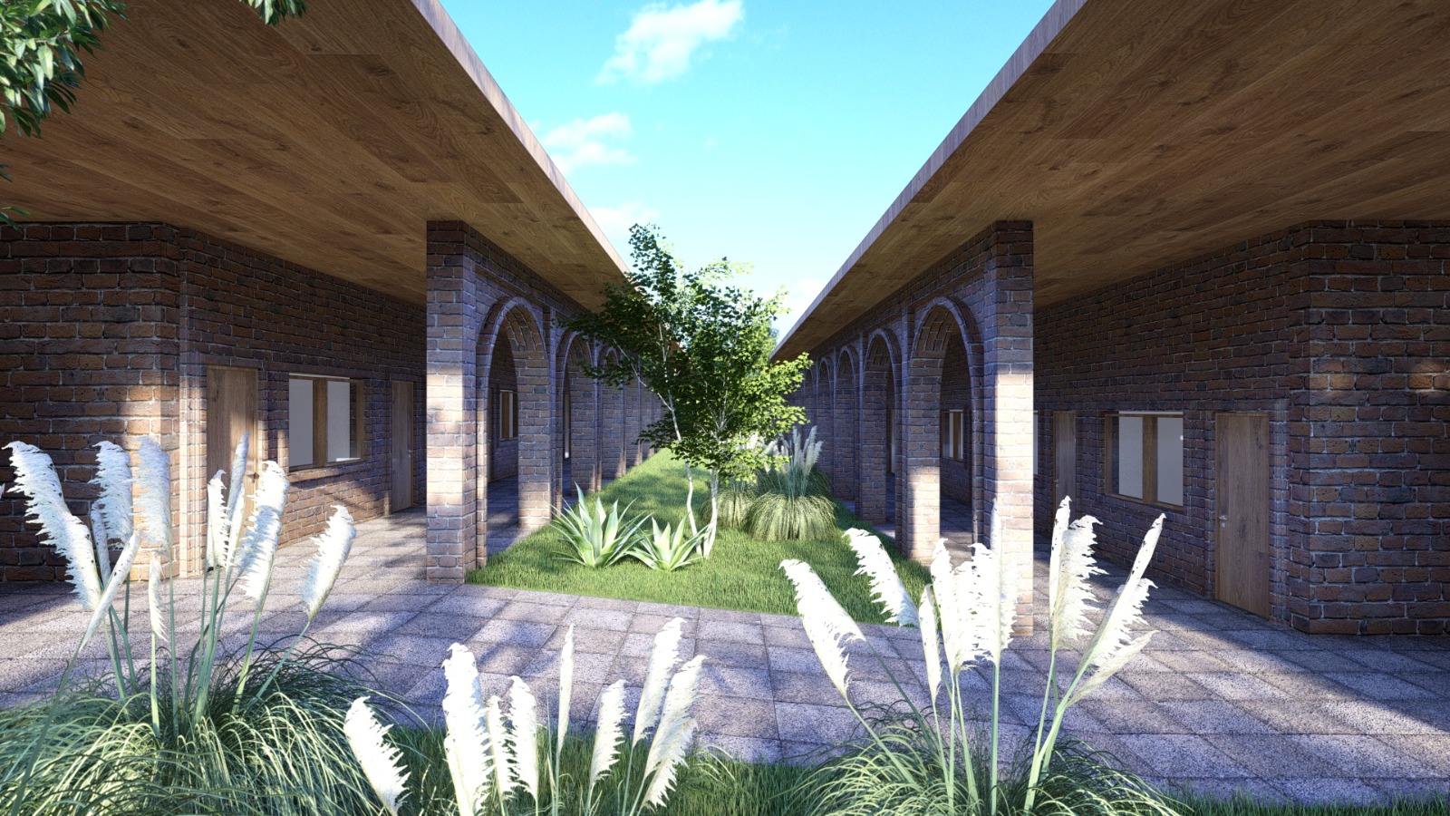 Pátio central entre os blocos de quartos, com jardim e vegetação